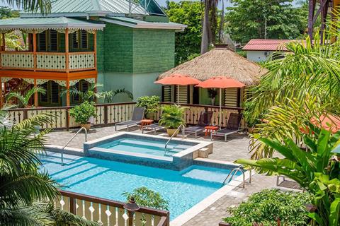 Deal zonvakantie Negril 🏝️ Country Country Beach Cottages 9 Dagen  €1153,-